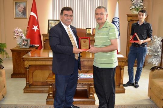 Mustafa ALAN'dan Odamıza Plaket...