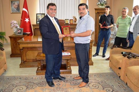 Mustafa ALAN'dan Odamıza Plaket...